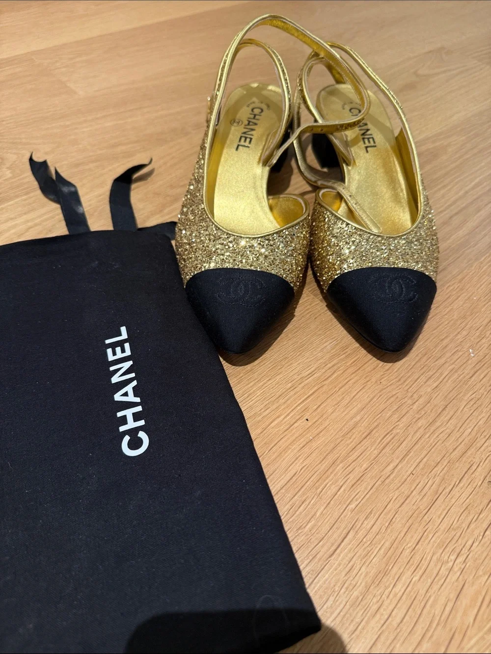 CHANEL Gold Glitter Slingback Mules with Black Cap Toe